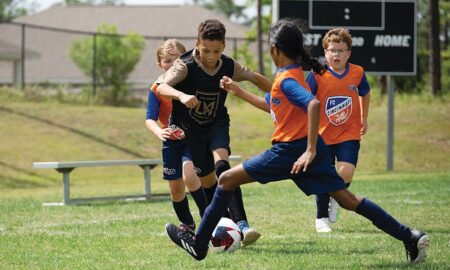 MLS GO players in Los Angeles Football Club black and FC Cincinnati orange MLS GO jerseys 450x270 - MLS impulsará al futbol infantil en los Estados Unidos